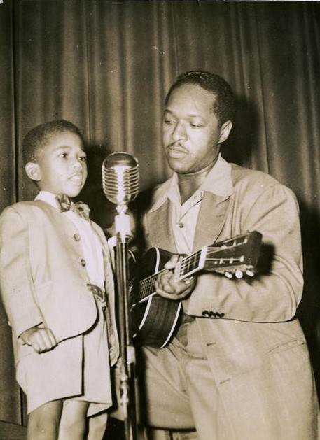 Father and son perform at Puerto Rican festival event